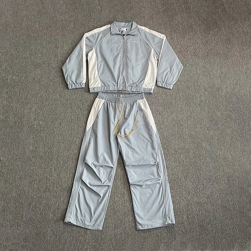 2026 New RHUDE Men's Style Embroidered Letter High Quality Stand Up Collar Windbreaker Pants Fashion Set